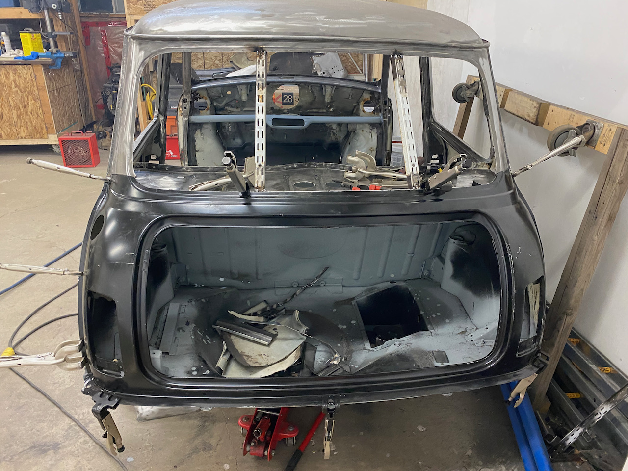 images/47_new_rear_panel_being_fitted.jpeg